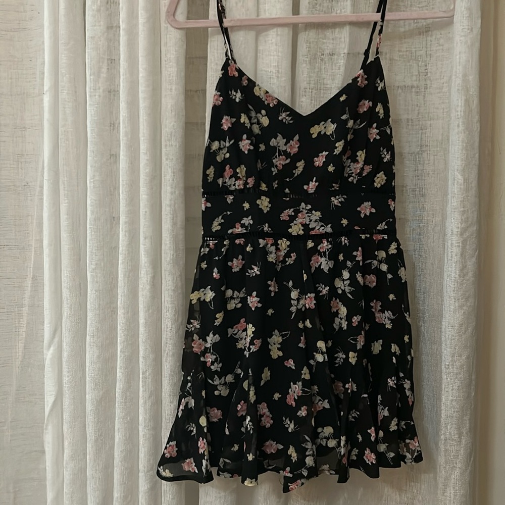 NWT Trixxi black floral romper. Size S. From Francesca’s.